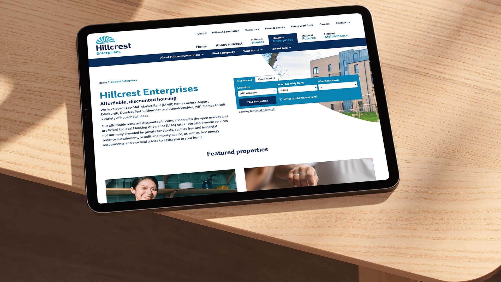 A tablet showcasing the Hillcrest website