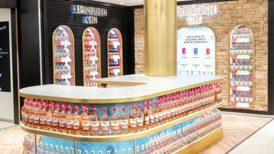 Ian MacLeod Distillers display in a duty free shopping area of an airport.