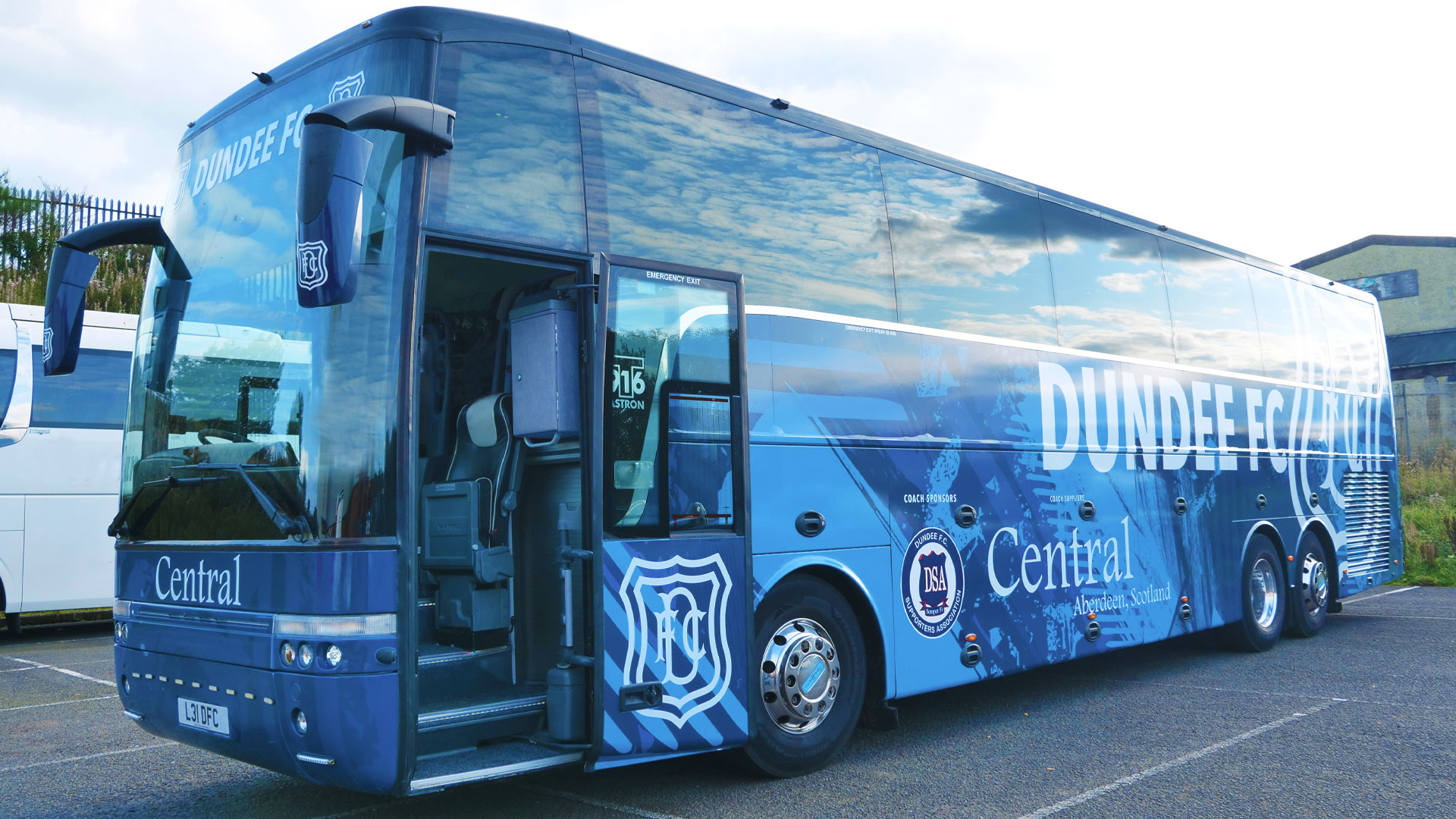 Dundee Fc bus with Dundee FC branding on the bus