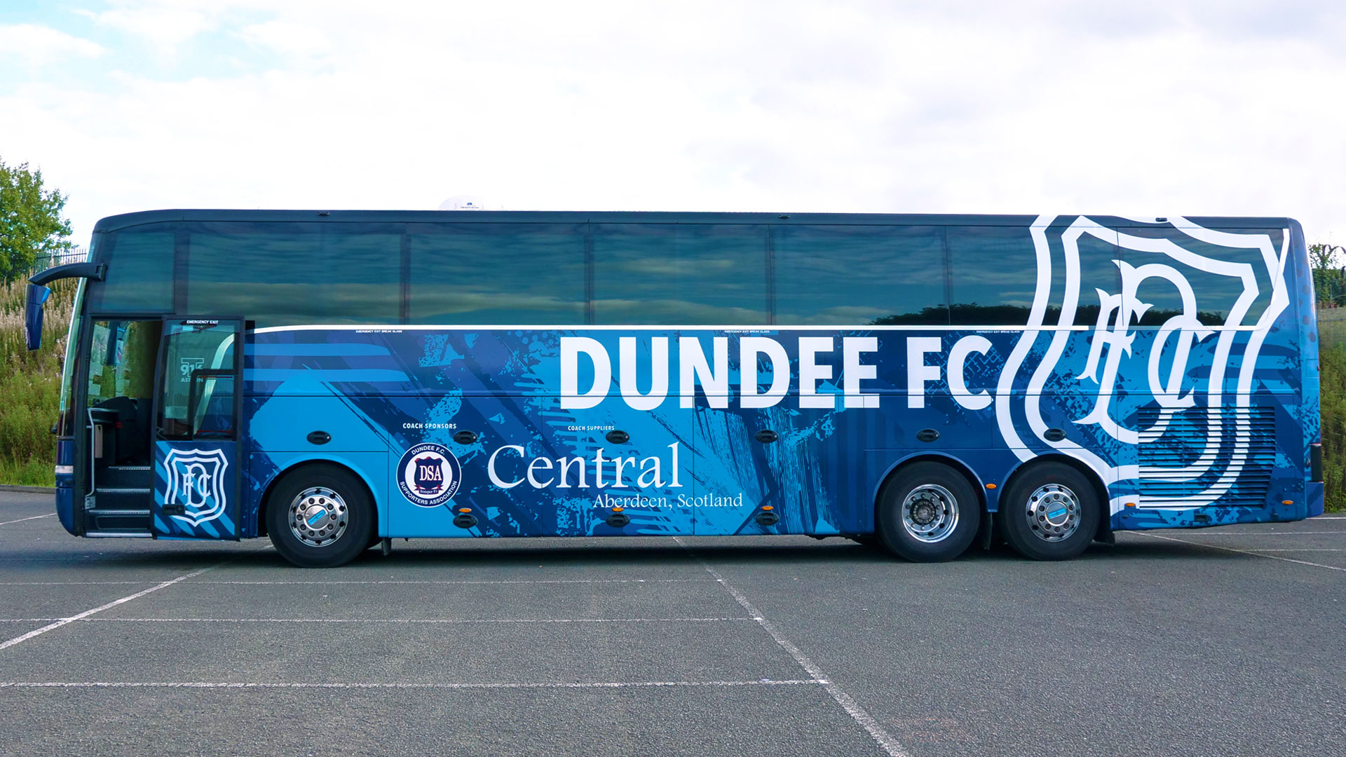Dundee Fc bus with Dundee FC branding on the side of the bus