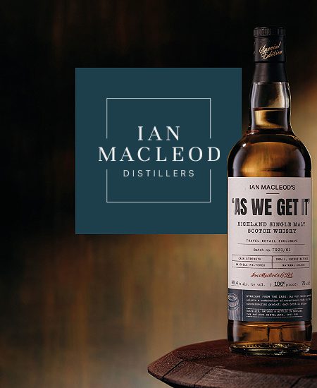 Ian Macleod Lego with a bottle of Whisky