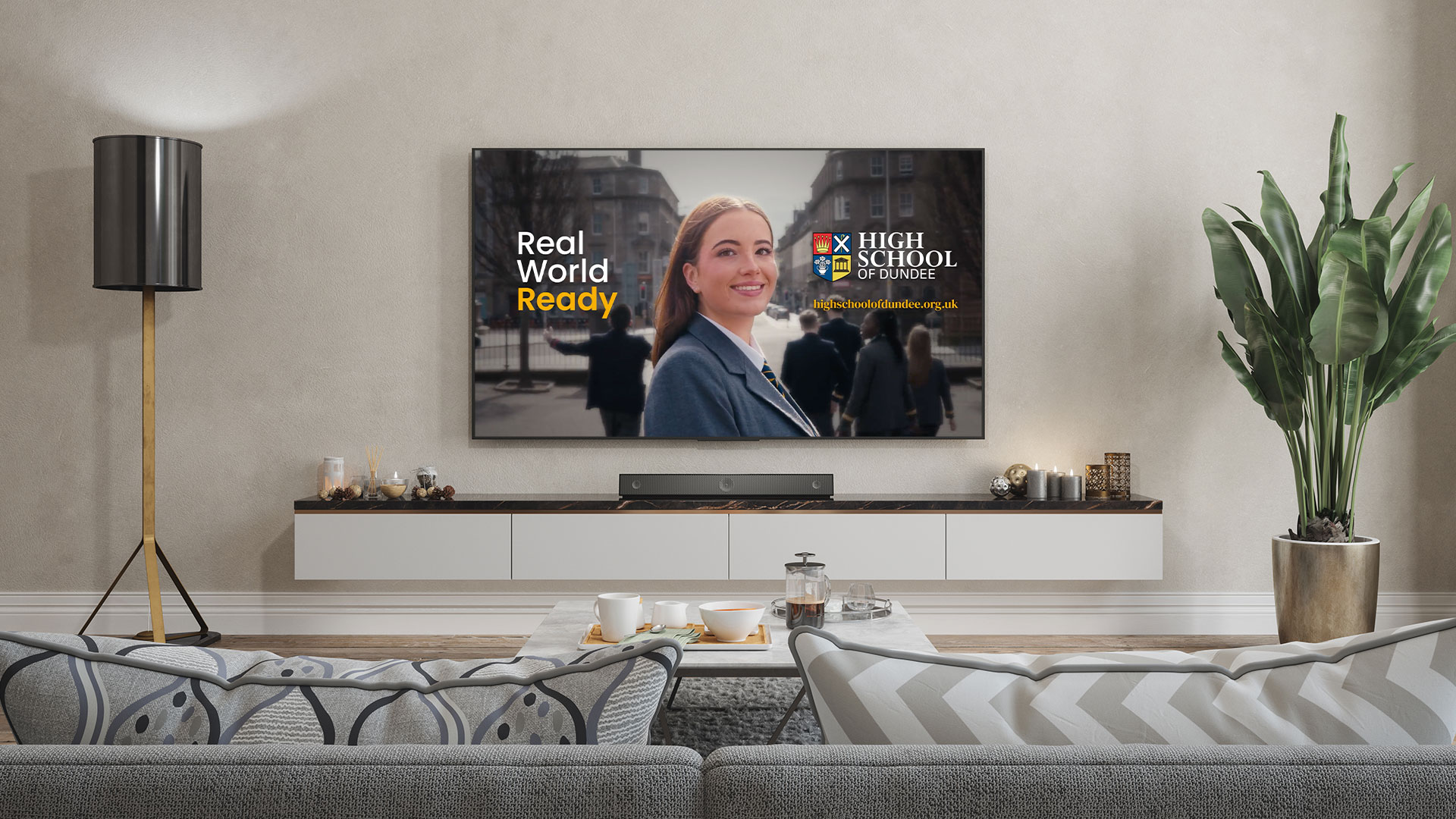 Example of the High School of Dundee tv advert displayed in a living room with a tv and couch