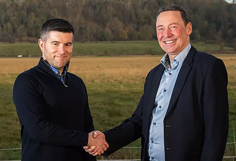 Chris and Nial shaking hands