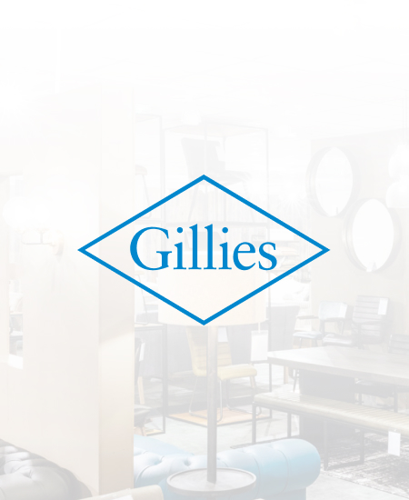 Gilles logo with a section of the store visible in the background.