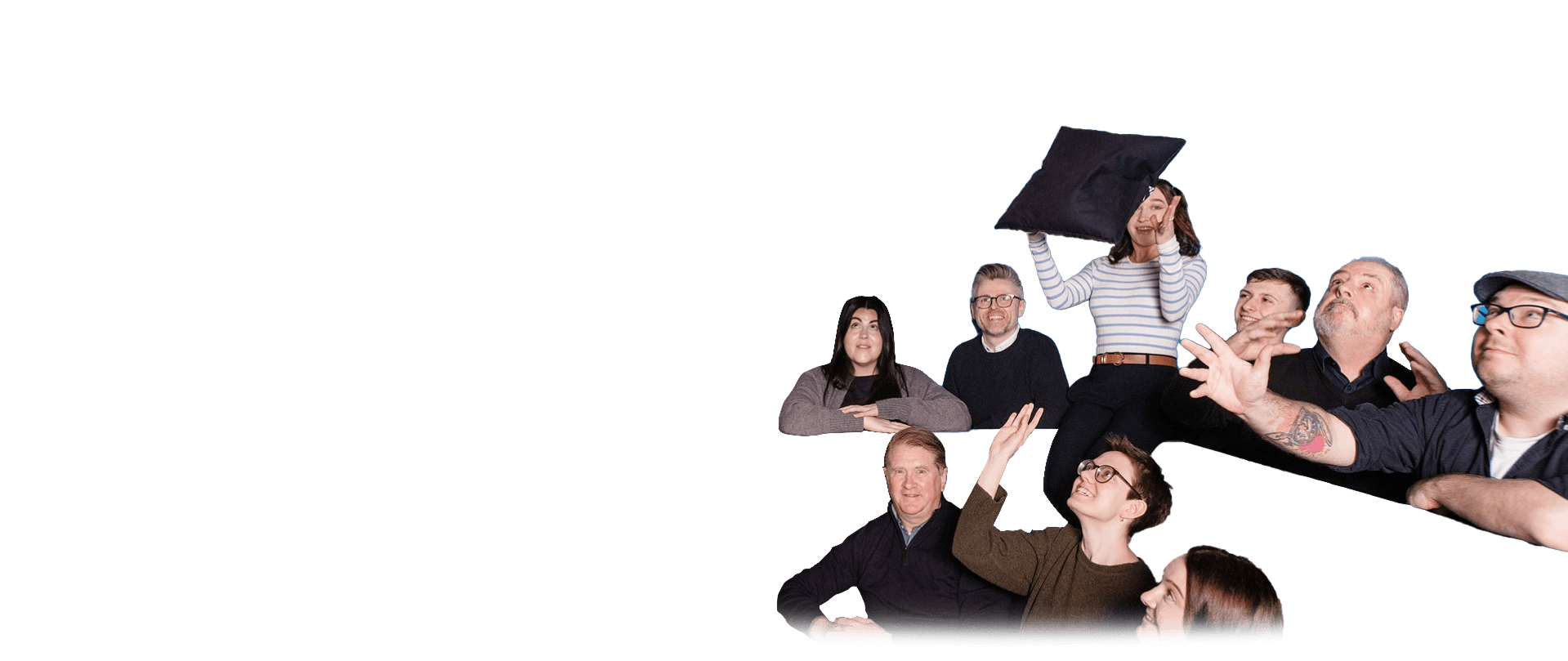 Altar staff members looking towards the flying cushions