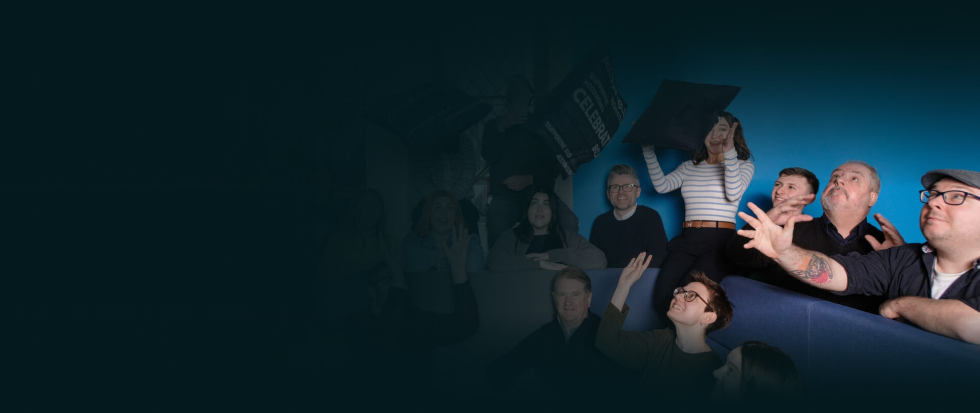 Altar staff members looking towards the flying cushions