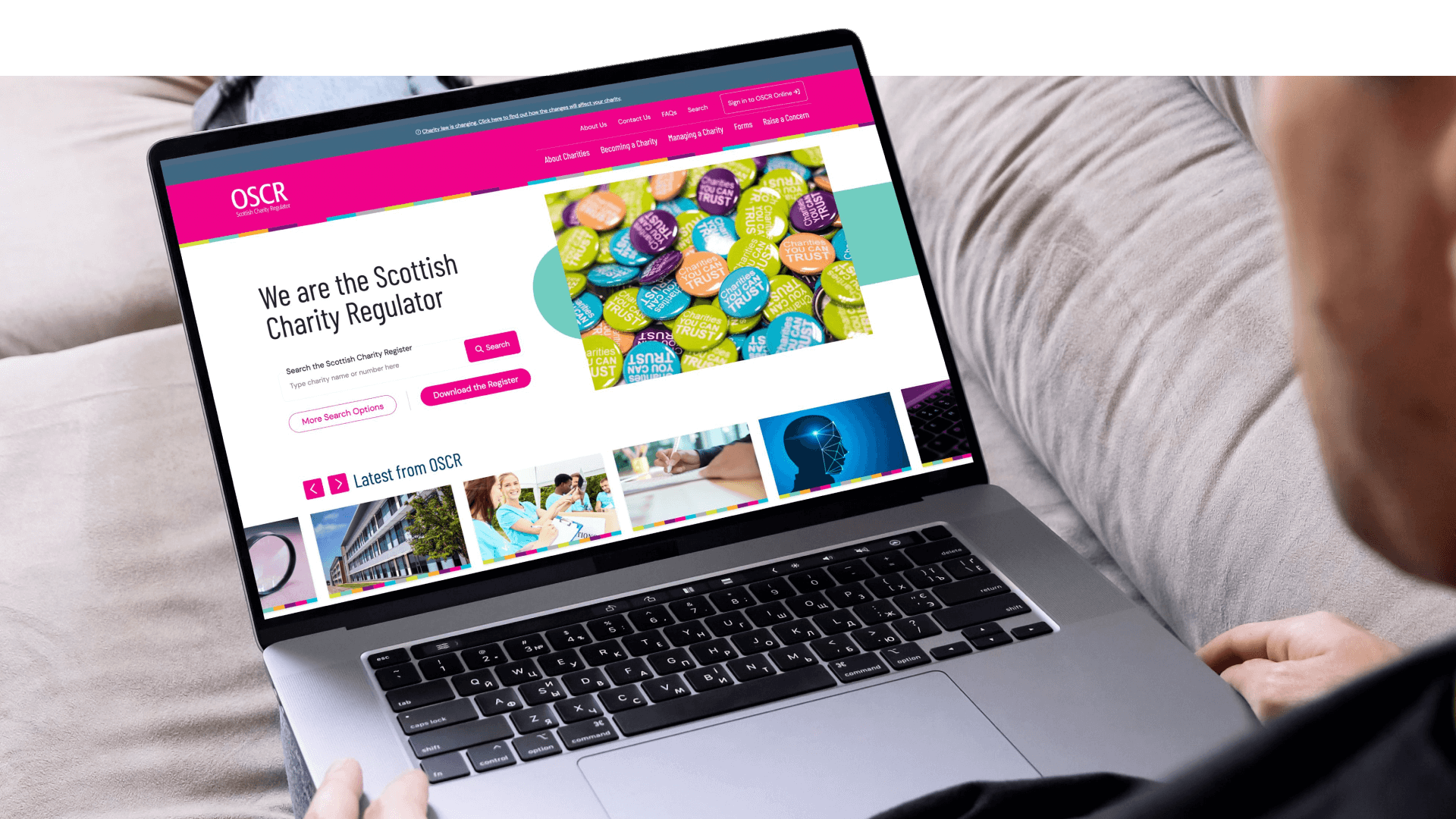 A laptop showcasing the OSCR website