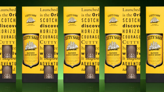 Display of multiple Cutty Sark packaging with two glasses and a bottle of Cutty Sark