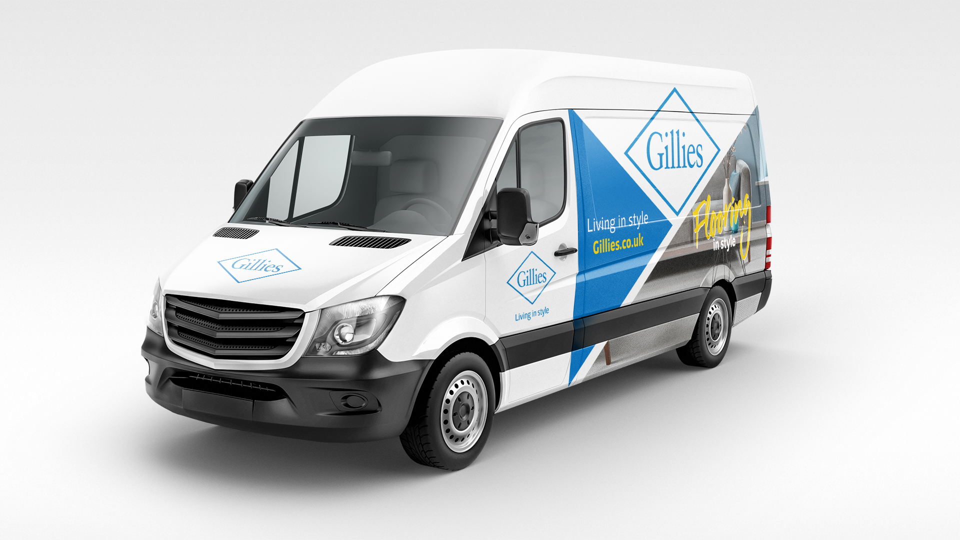 A van displaying signage for Gilles with the Gilles logo on the front and sides of the van.