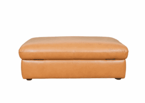 Tan leather Catalyna storage ottoman with cushioned top and hidden internal storage.