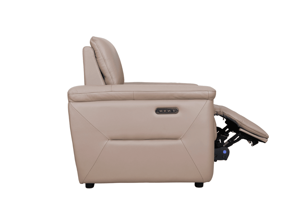 The Innovation Power Armchair combines modern style with effortless comfort. Its power-adjustable headrest allows you to fine-tune your support at the touch of a button, making it ideal for everyday relaxation. Available in a wide range of premium fabrics and leathers, it fits seamlessly into both contemporary and classic interiors. A stylish, made-to-order armchair designed... Innovation power armchair with power-adjustable headrest, shown in premium upholstery.