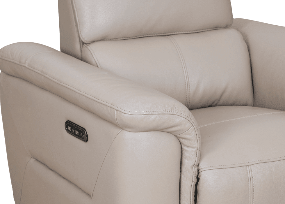 The Innovation Power Armchair combines modern style with effortless comfort. Its power-adjustable headrest allows you to fine-tune your support at the touch of a button, making it ideal for everyday relaxation. Available in a wide range of premium fabrics and leathers, it fits seamlessly into both contemporary and classic interiors. A stylish, made-to-order armchair designed... Innovation power armchair with power-adjustable headrest, shown in premium upholstery.