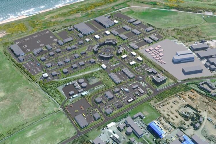 An aerial digital rendering of a large, organized business park development near a coastline, showing numerous grey commercial buildings, parking lots, and green landscaping.