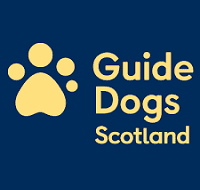 A high-contrast logo on a dark blue background featuring a yellow paw print icon next to the stacked text "Guide Dogs Scotland" in a rounded, yellow sans-serif font.