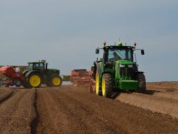 Tractors in a field representing agritech