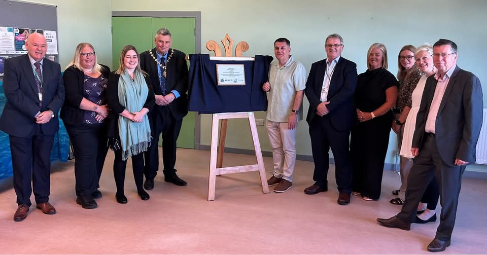 B'Hive at Boglestone Community Centre official opening plaque unveiling. From left, Councillor Robert Moran, Claire Saunderson, Depute Council Leader Natasha McGuire, Provost Drew McKenzie, Council Leader Stephen McCabe, Inverclyde Council Chief Executive Stuart Jamieson, Claire Millar, Inverclyde Council Corporate Director of Education and Communities Ruth Binks, Councillor Francesca Brennan, and Education and Communities Convener Jim Clocherty. 