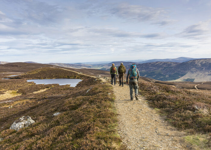Walkers by Loch Brandy in Glen Clova, one of the Angus Glens
