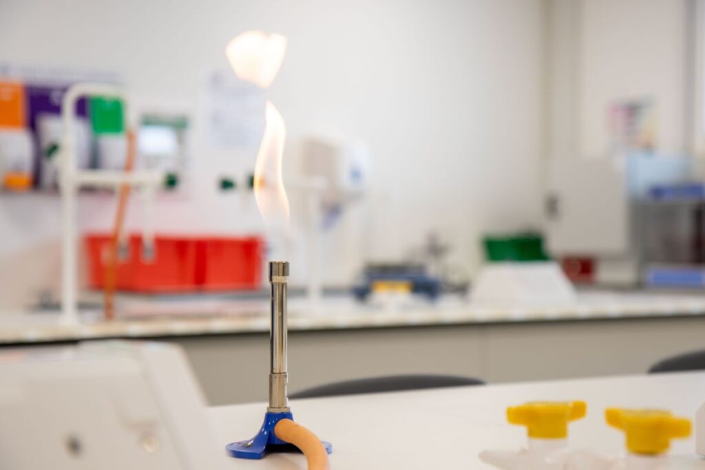 A bunsen burner in a lab
