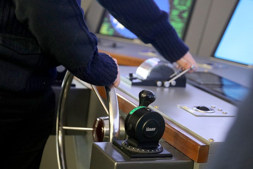 Close-up of student using the training simulator