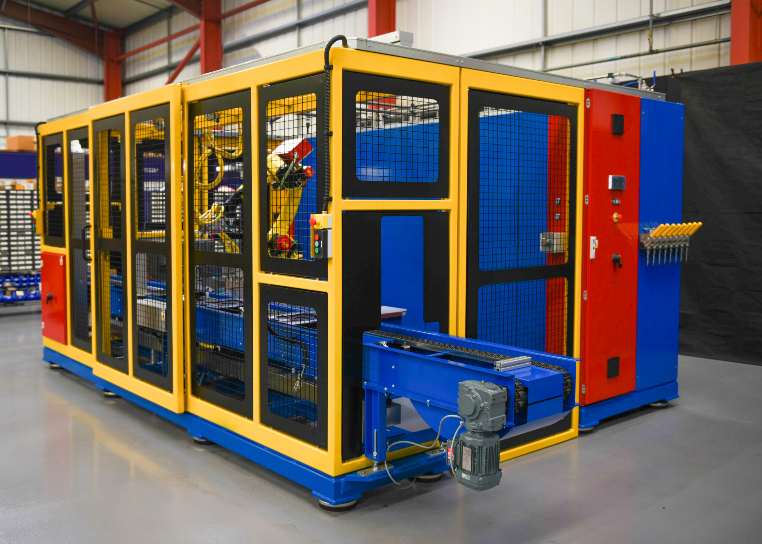 Automated oil filling robot inside safety guarding