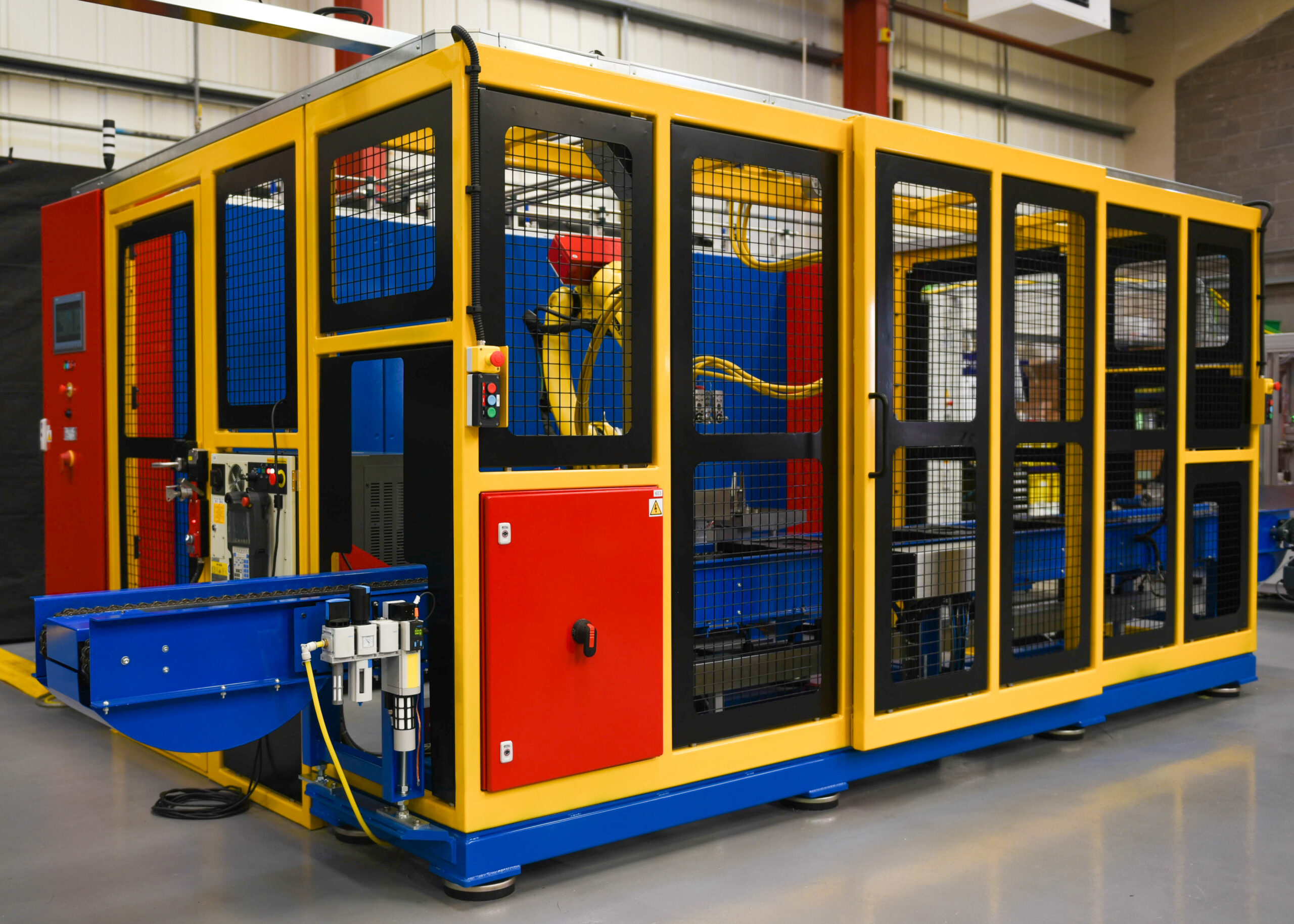 Automated oil filling robot within safety guarding