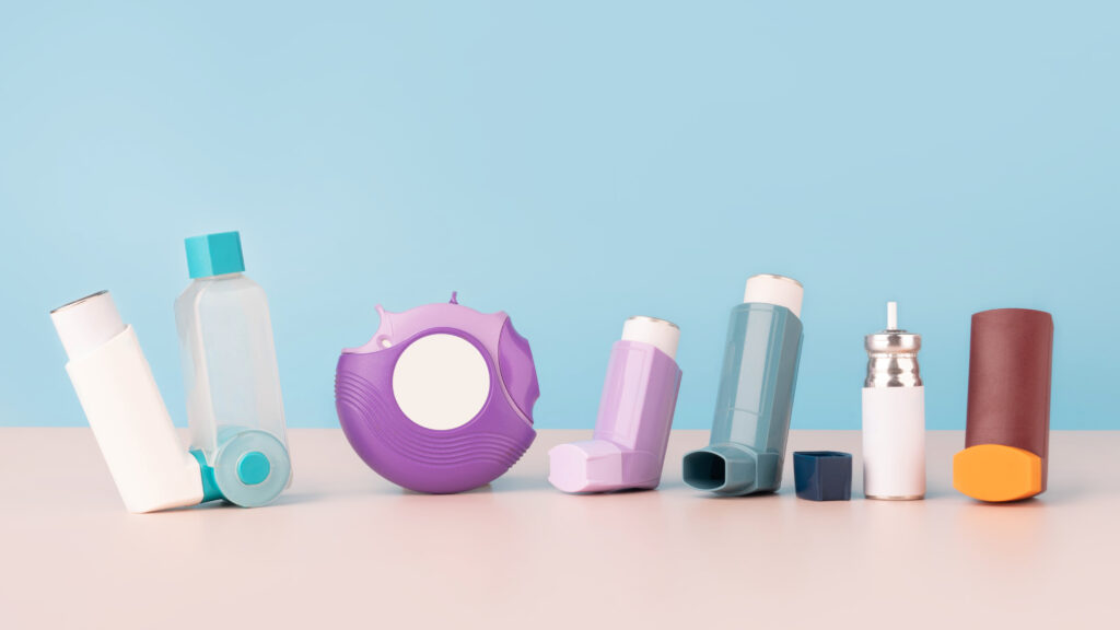 Set of asthma inhalers for asthma and COPD patients on table