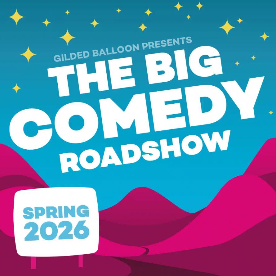 Promotional poster for "The Big Comedy Roadshow," presented by Gilded Balloon and touring in Spring 2026. The graphic features a vibrant illustration with a teal/blue starry sky above large, stylized pink/purple hills or dunes that suggest a road or journey. The title text is in large white letters. A white sign in the bottom left corner says "SPRING 2026" in blue text.