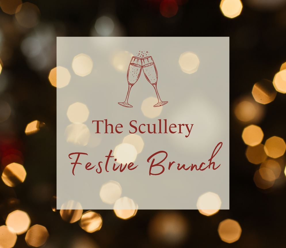 A digital invitation for "The Scullery Festive Brunch." The background is a dark, out-of-focus image of golden, reddish, and white bokeh lights. A slightly transparent square in the center features a line drawing of two champagne flutes clinking above the text "The Scullery Festive Brunch" in red and dark red script.