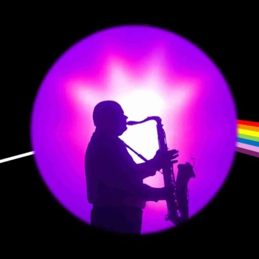A silhouette of a person playing a saxophone is centered within a glowing purple circle against a black background. A thin white light enters from the left and exits on the right as a vibrant rainbow beam, evoking the iconic "Dark Side of the Moon" prism imagery.