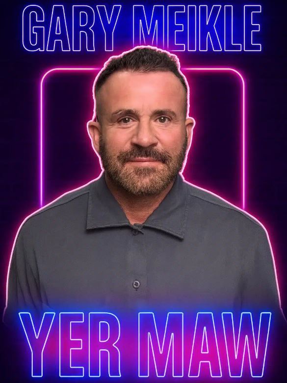 A promotional poster for comedian Gary Meikle's show titled "YER MAW." The image features a portrait of Meikle, a bearded man with short dark hair, wearing a grey button-up shirt. He is centered against a dark background, framed by a glowing pink neon square and bright blue neon text at the top and bottom.