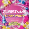 A vibrant, pink-themed promotional graphic for a "CHRISTMAS K-POP PARTY" brought to you by "K-POP KINGDOM." The text is centered amidst a swirl of festive 3D elements, including wrapped yellow and blue gifts, colorful ornaments, a stylized blue Christmas tree, and a pink stocking.