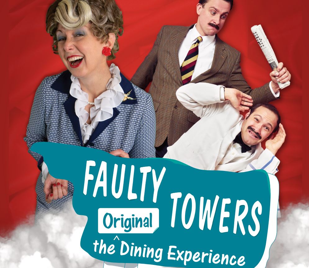 A promotional image against a red background featuring three actors portraying characters from "Fawlty Towers." On the left, a woman with styled blonde hair and a blue patterned suit laughs heartily. In the upper right, a man in a brown blazer and striped tie looks annoyed while holding a newspaper, and below him, a man in a white waiter's jacket poses comically. A teal splash graphic in the foreground contains the white text "FAULTY TOWERS Original the Dining Experience" above a layer of white clouds.