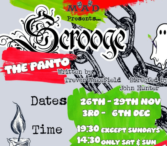 Promotional poster for Scrooge: The Panto, featuring stylised black chains, colourful paint-stroke graphics in red and green, a candle illustration and a small ghost figure. The title is displayed in decorative gothic-style lettering, with performance dates and times highlighted prominently across the design.